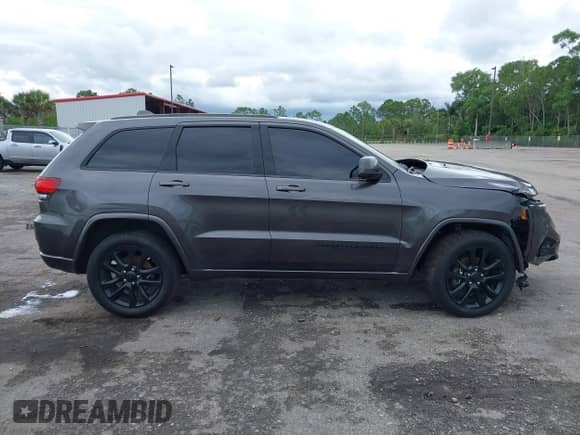 2018 Jeep Grand Cherokee Altitude with VIN 1C4RJEAG2JC428214, listed as a IAAI auction lot 42661661 with 81,859 mi miles and . Bid and sale history available at DreamBid. Image 14.