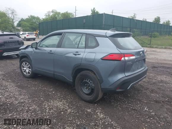 2022 Toyota Corolla Cross L with VIN 7MUAAABG0NV024424, listed as a IAAI auction lot 42261227 with 20,171 mi miles and . Bid and sale history available at DreamBid. Image 3.