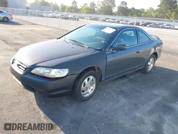 1999 Honda Accord EX z VIN 1HGCG3277XA016352, wystawiony jako IAAI lot #43101775 z przebiegiem Nie podano mil oraz . Historia ofert i sprzedaży dostępna na DreamBid. Obrazek 2.