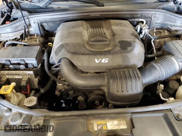 2015 Dodge Durango SXT z VIN 1C4RDJAG1FC857285, wystawiony jako Copart lot #63253505 z przebiegiem 215 094 mil mil oraz Szkoda całkowita • Salvage title. Historia ofert i sprzedaży dostępna na DreamBid. Obrazek 12.