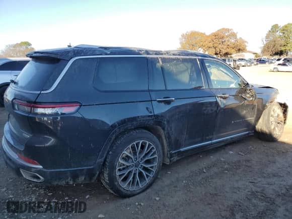 2021 Jeep Grand Cherokee Summit Reserve with VIN 1C4RJKET9M8197423, listed as a Copart auction lot 84758234 with 105,805 mi miles and Salvage title. Bid and sale history available at DreamBid. Image 3.