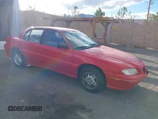 1996 Pontiac Grand Am SE z VIN 1G2NE52T7TC851196, wystawiony jako IAAI lot #41700021 z przebiegiem 250 393 mil mil oraz . Historia ofert i sprzedaży dostępna na DreamBid. Obrazek 1.