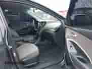 2015 Hyundai Santa Fe z VIN 5XYZTDLB8FG261026, wystawiony jako IAAI lot #42872886 z przebiegiem 146 244 mil mil oraz . Historia ofert i sprzedaży dostępna na DreamBid. Obrazek 5.