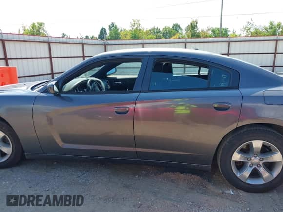 2014 Dodge Charger SXT with VIN 2C3CDXHG0EH258716, listed as a IAAI auction lot 43128720 with 155,555 mi miles and . Bid and sale history available at DreamBid. Image 14.