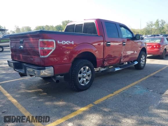 2013 Ford F-150 Lariat with VIN 1FTFW1ET5DKD04467, listed as a IAAI auction lot 43355676 with 124,871 mi miles and . Bid and sale history available at DreamBid. Image 4.