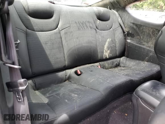 2013 Hyundai Genesis Coupe R-Spec z VIN KMHHU6KJ2DU103155, wystawiony jako Copart lot #57140335 z przebiegiem 117 760 mil mil oraz Szkoda całkowita • Salvage title. Historia ofert i sprzedaży dostępna na DreamBid. Obrazek 10.