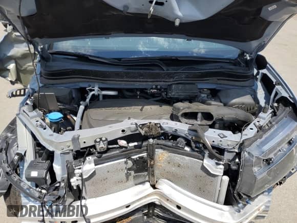 2024 Honda Passport EX-L with VIN 5FNYF8H54RB007175, listed as a Copart auction lot 66188065 with 20,119 mi miles and Salvage title. Bid and sale history available at DreamBid. Image 12.