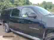 2011 Chevrolet Suburban LT z VIN 1GNSCJE05BR309175, wystawiony jako IAAI lot #43040737 z przebiegiem 183 443 mil mil oraz . Historia ofert i sprzedaży dostępna na DreamBid. Obrazek 13.
