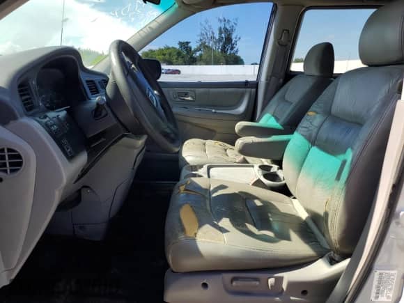 2003 Honda Odyssey EX с VIN 5FNRL186X3B001580, выставлен на аукционе Copart как лот 70352785 с пробегом Не указан миль и На запчасти • Non repairable. История ставок и продаж доступна на DreamBid. Изображение 7.