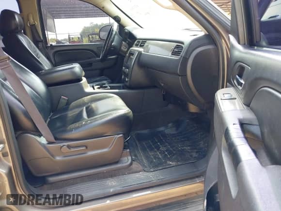 2014 Chevrolet Tahoe Commercial with VIN 1GNLC2E0XER104529, listed as a IAAI auction lot 43217631 with 237,010 mi miles and . Bid and sale history available at DreamBid. Image 5.