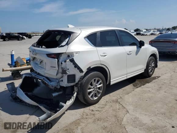 2024 Mazda CX-5 S Carbon Edition z VIN JM3KFBCM5R0352688, wystawiony jako Copart lot #66491765 z przebiegiem 20 904 mil mil oraz Szkoda całkowita • Salvage title. Historia ofert i sprzedaży dostępna na DreamBid. Obrazek 3.