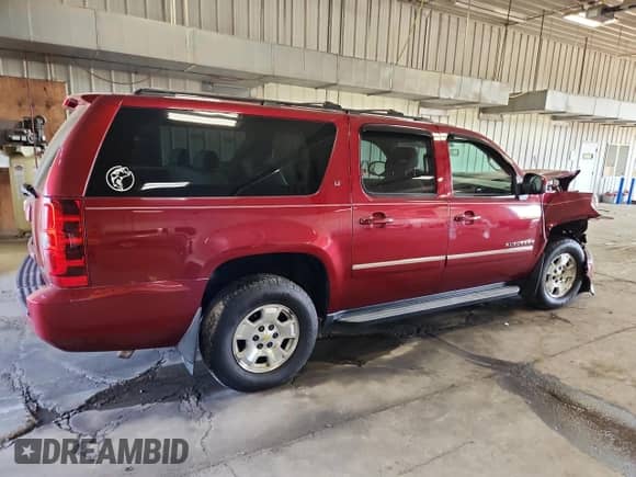 2011 Chevrolet Suburban LT z VIN 1GNSKJE35BR117199, wystawiony jako Copart lot #71034395 z przebiegiem 141 641 mil mil oraz Nie do naprawy • Non repairable. Historia ofert i sprzedaży dostępna na DreamBid. Obrazek 3.