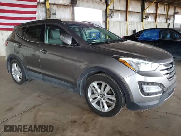 2013 Hyundai Santa Fe Sport z VIN 5XYZU3LA5DG117297, wystawiony jako Copart lot #70342135 z przebiegiem 136 447 mil mil oraz Szkoda całkowita • Salvage title. Historia ofert i sprzedaży dostępna na DreamBid. Obrazek 4.