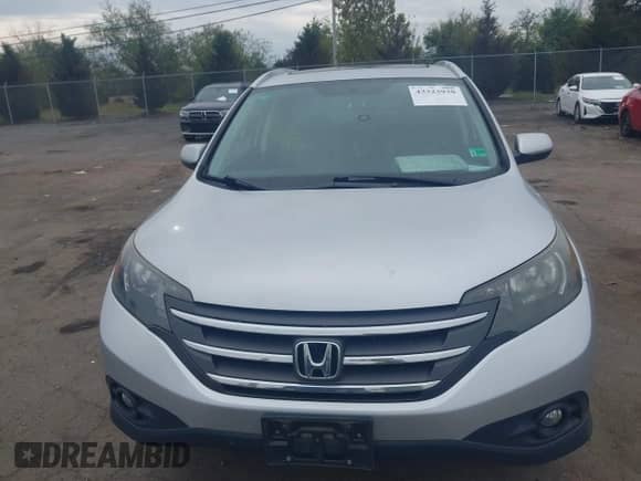 2014 Honda CR-V EX-L with VIN 2HKRM4H72EH609315, listed as a IAAI auction lot 43323930 with 142,569 mi miles and . Bid and sale history available at DreamBid. Image 13.