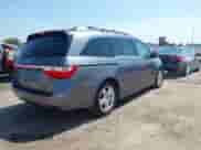 2011 Honda Odyssey Touring with VIN 5FNRL5H92BB093316, listed as a IAAI auction lot 43171437 with 155,403 mi miles and . Bid and sale history available at DreamBid. Image 4.