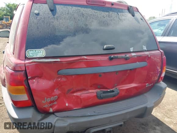 2002 Jeep Grand Cherokee Sport with VIN 1J4GW38S72C276689, listed as a IAAI auction lot 42586977 with 360,258 mi miles and . Bid and sale history available at DreamBid. Image 12.