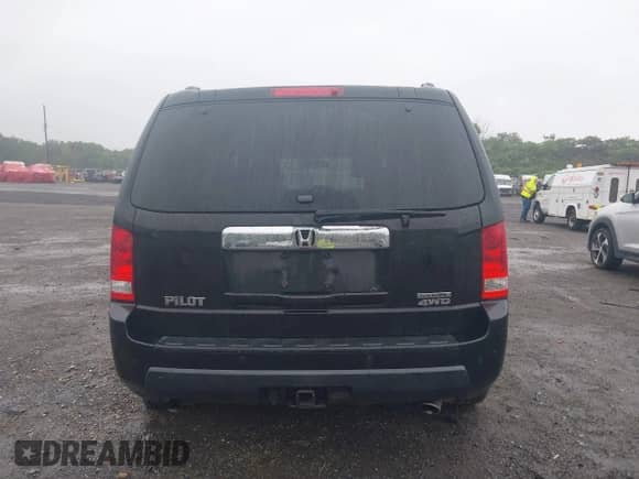 2010 Honda Pilot Touring with VIN 5FNYF4H84AB011640, listed as a IAAI auction lot 43037958 with 155,985 mi miles and . Bid and sale history available at DreamBid. Image 16.