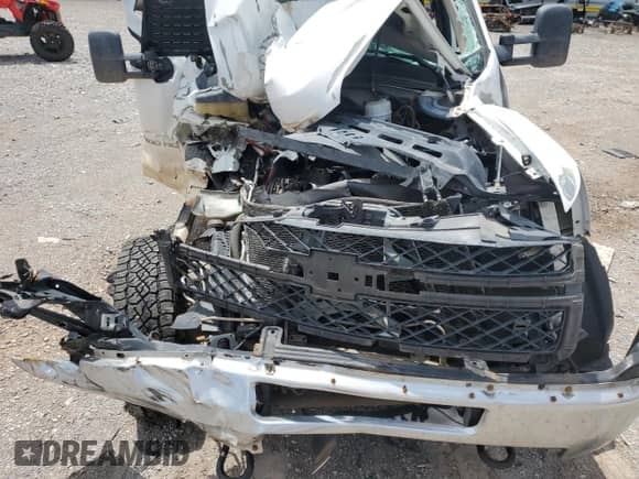 2012 Chevrolet Silverado 2500HD Work Truck z VIN 1GB0CVCG0CF102966, wystawiony jako Copart lot #59737985 z przebiegiem Nie podano mil oraz Szkoda całkowita • Salvage title. Historia ofert i sprzedaży dostępna na DreamBid. Obrazek 11.
