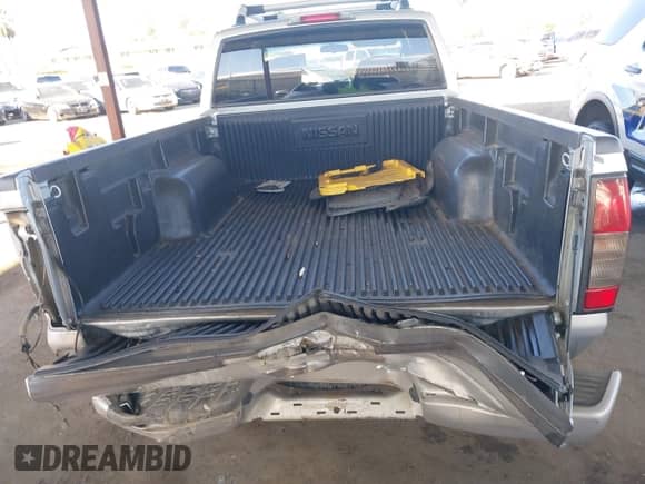 2003 Nissan Frontier SVE with VIN 1N6MD29Y63C465571, listed as a IAAI auction lot 41502613 with 175,996 mi miles and . Bid and sale history available at DreamBid. Image 17.