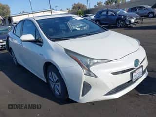 2016 Toyota Prius Four z VIN JTDKARFU7G3502954, wystawiony jako IAAI lot #42652179 z przebiegiem 219 669 mil mil oraz . Historia ofert i sprzedaży dostępna na DreamBid. Obrazek 1.