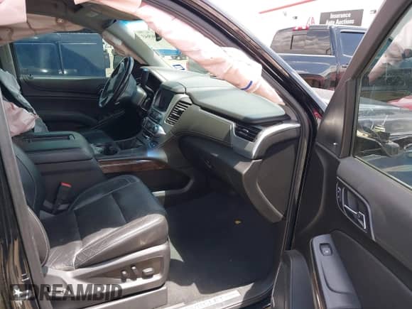 2019 Chevrolet Tahoe LT with VIN 1GNSCBKC5KR327874, listed as a IAAI auction lot 42565643 with 79,213 mi miles and . Bid and sale history available at DreamBid. Image 5.