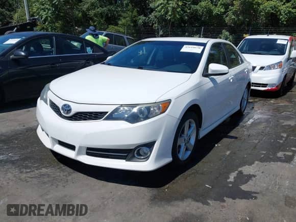 2014 Toyota Camry L with VIN 4T1BF1FK1EU431867, listed as a IAAI auction lot 43118670 with 169,051 mi miles and . Bid and sale history available at DreamBid. Image 2.