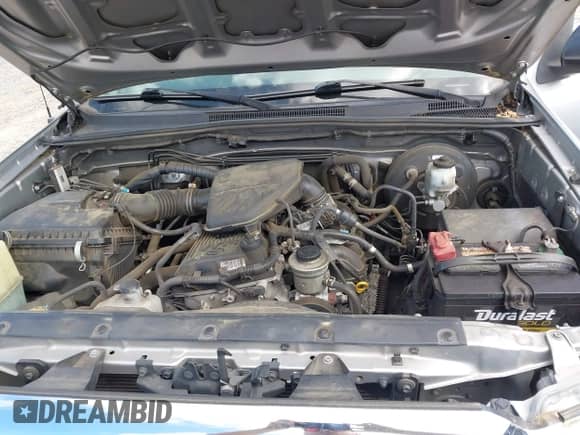 2015 Toyota Tacoma PreRunner z VIN 5TFTX4GN6FX050905, wystawiony jako IAAI lot #42189698 z przebiegiem 115 728 mil mil oraz . Historia ofert i sprzedaży dostępna na DreamBid. Obrazek 10.