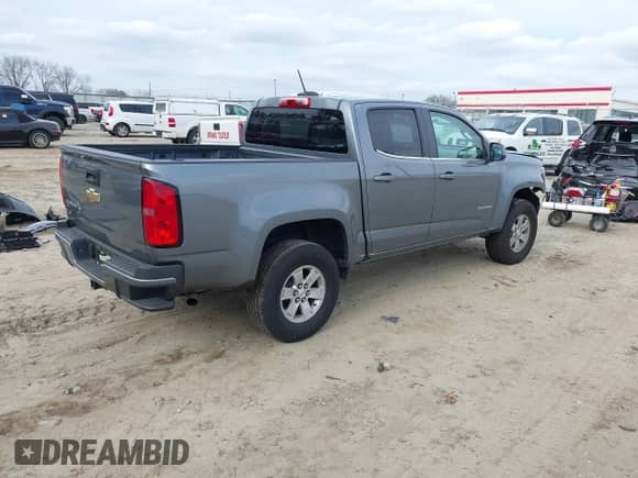 2019 Chevrolet Colorado 2WD Work Truck with VIN 1GCGSBEN1K1335970, listed as a IAAI auction lot 41521896 with 41,018 mi miles and . Bid and sale history available at DreamBid. Image 4.