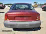 1998 Saturn SL with VIN 1G8ZH528XWZ144301, listed as a Copart auction lot 75918414 with 219,256 mi miles and Salvage title. Bid and sale history available at DreamBid. Image 6.