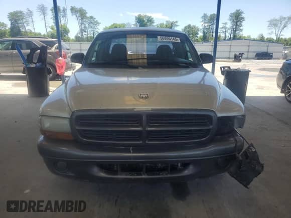 2002 Dodge Dakota с VIN 1B7GL12X32S566683, выставлен на аукционе Copart как лот 56896145 с пробегом 229 321 миль миль и Списание • Salvage title. История ставок и продаж доступна на DreamBid. Изображение 5.
