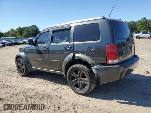 2011 Dodge Nitro Heat z VIN 1D4PT4GK5BW589795, wystawiony jako Copart lot #70257423 z przebiegiem 140 599 mil mil oraz Szkoda całkowita • Salvage title. Historia ofert i sprzedaży dostępna na DreamBid. Obrazek 2.