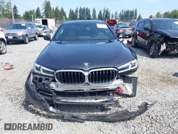 2022 BMW 5 Series 530i xDrive with VIN WBA13BJ09NWX51234, listed as a IAAI auction lot 42106974 with 26,480 mi miles and . Bid and sale history available at DreamBid. Image 12.