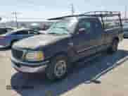 1998 Ford F-150 with VIN 1FTZX1763WKA58006, listed as a Copart auction lot 57264195 with 273,690 mi miles and Salvage title. Bid and sale history available at DreamBid. Image 1.