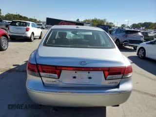 2007 Hyundai Azera SE с VIN KMHFC46F57A201980, выставлен на аукционе Copart как лот 74619494 с пробегом Не указан миль и Списание • Salvage title. История ставок и продаж доступна на DreamBid. Изображение 6.