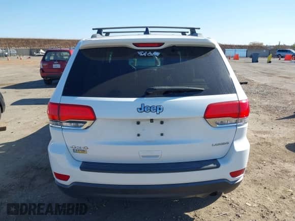 2014 Jeep Grand Cherokee Laredo with VIN 1C4RJFAG2EC283641, listed as a IAAI auction lot 43436412 with 195,041 mi miles and . Bid and sale history available at DreamBid. Image 16.