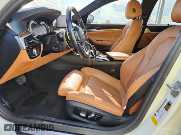 2019 BMW 5 Series 540i с VIN WBAJE5C53KBM77018, выставлен на аукционе Copart как лот 65531375 с пробегом 129 457 миль миль и Чистый • Clean title. История ставок и продаж доступна на DreamBid. Изображение 7.