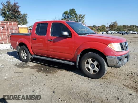 2005 Nissan Frontier Nismo with VIN 1N6AD07WX5C421164, listed as a Copart auction lot 82762115 with 176,610 mi miles and Clean title. Bid and sale history available at DreamBid. Image 4.