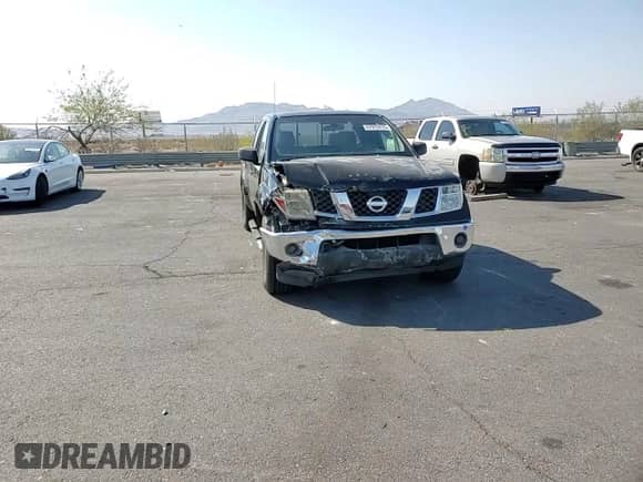 2007 Nissan Frontier SE with VIN 1N6AD06U77C458580, listed as a Copart auction lot 67972415 with 142,295 mi miles and Salvage title. Bid and sale history available at DreamBid. Image 14.