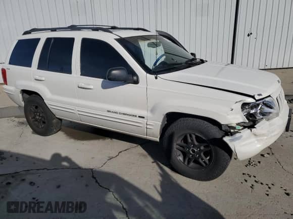 2000 Jeep Grand Cherokee Limited с VIN 1J4GW58S9YC397339, выставлен на аукционе Copart как лот 84960754 с пробегом 205 983 миль миль и Списание • Salvage title. История ставок и продаж доступна на DreamBid. Изображение 4.