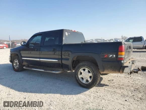 2004 GMC Sierra 1500 SLT with VIN 2GTEK13T541370088, listed as a Copart auction lot 82780284 with 394,164 mi miles and Salvage title. Bid and sale history available at DreamBid. Image 2.