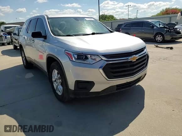 2018 Chevrolet Traverse LS с VIN 1GNERFKW9JJ143404, выставлен на аукционе Copart как лот 71166085 с пробегом 184 666 миль миль и Списание • Salvage title. История ставок и продаж доступна на DreamBid. Изображение 14.