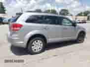 2018 Dodge Journey SE with VIN 3C4PDCAB0JT525021, listed as a Copart auction lot 64236265 with 104,675 mi miles and Salvage title. Bid and sale history available at DreamBid. Image 3.
