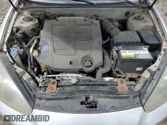 2008 Hyundai Tiburon GT с VIN KMHHN66F48U270030, выставлен на аукционе Copart как лот 55349275 с пробегом 205 068 миль миль и Списание • Salvage title. История ставок и продаж доступна на DreamBid. Изображение 11.