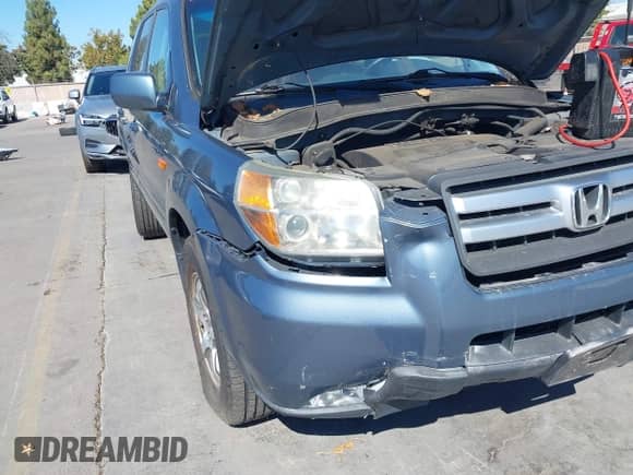 2006 Honda Pilot EX-L z VIN 5FNYF28766B027048, wystawiony jako IAAI lot #43383058 z przebiegiem 125 706 mil mil oraz . Historia ofert i sprzedaży dostępna na DreamBid. Obrazek 15.