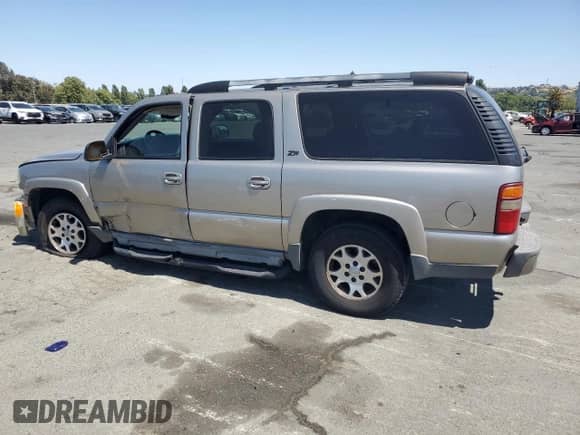 2003 Chevrolet Suburban Z71 with VIN 3GNFK16TX3G178890, listed as a Copart auction lot 62189535 with 158,090 mi miles and Salvage title. Bid and sale history available at DreamBid. Image 2.