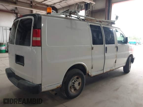 2009 Chevrolet Express Cargo with VIN 1GCGG25C391112632, listed as a IAAI auction lot 42320185 with 166,012 mi miles and . Bid and sale history available at DreamBid. Image 4.