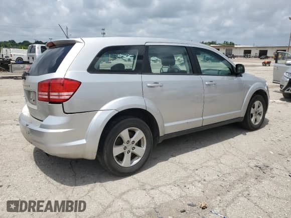 2013 Dodge Journey SE с VIN 3C4PDCAB6DT547576, выставлен на аукционе Copart как лот 61237395 с пробегом 171 323 миль миль и На запчасти • Non repairable. История ставок и продаж доступна на DreamBid. Изображение 3.