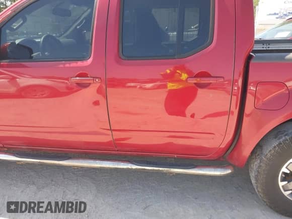 2014 Nissan Frontier S with VIN 1N6AD0EV3EN734085, listed as a IAAI auction lot 42007200 with Not provided miles and . Bid and sale history available at DreamBid. Image 6.