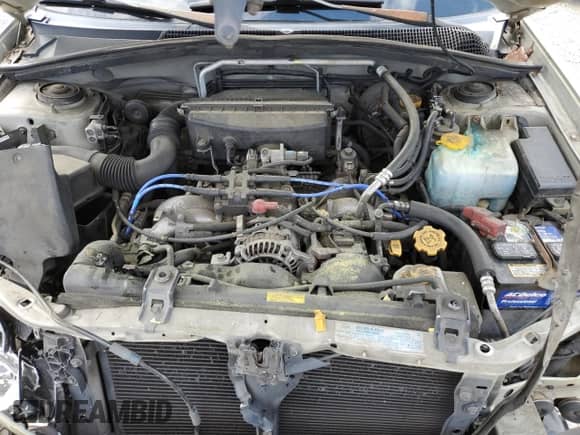 2004 Subaru Forester X with VIN JF1SG63694H754485, listed as a Copart auction lot 54949165 with 189,573 mi miles and Salvage title. Bid and sale history available at DreamBid. Image 12.