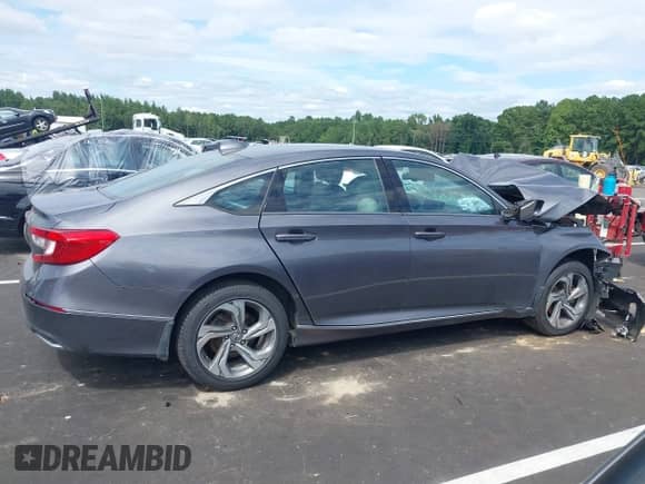 2020 Honda Accord EX-L with VIN 1HGCV1F5XLA091012, listed as a IAAI auction lot 43059353 with 114,611 mi miles and . Bid and sale history available at DreamBid. Image 13.